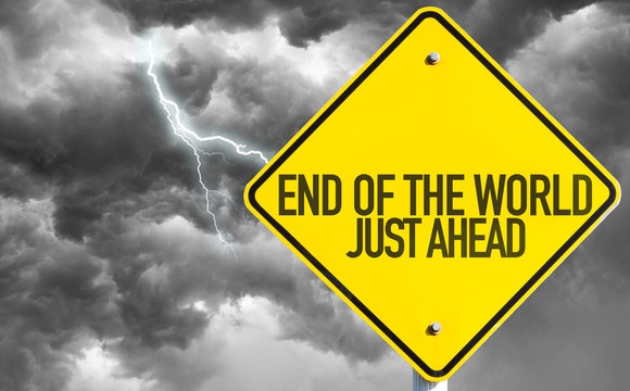 A yellow diamond road sign reads END OF THE WORLD JUST AHEAD against a dark, stormy sky with swirling clouds and a flash of lightning.