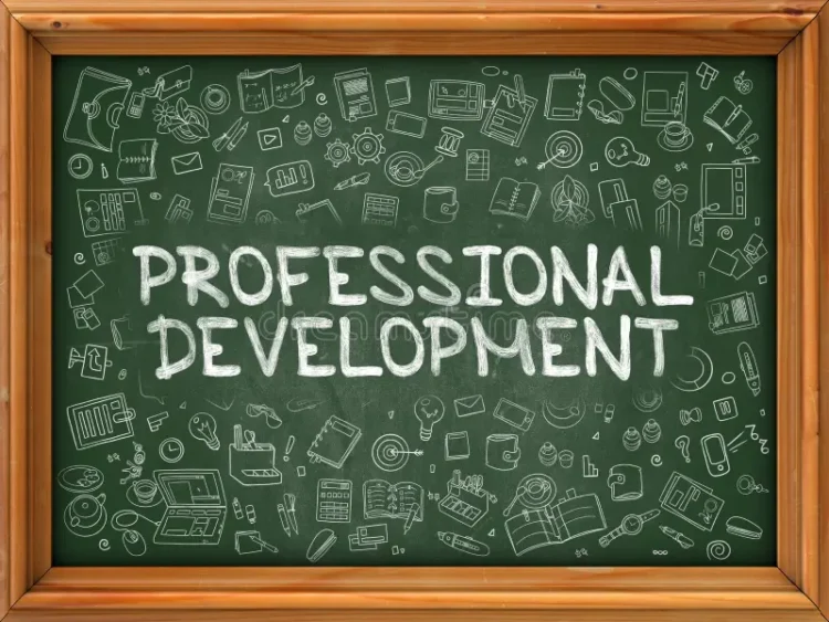 A chalkboard with Professional Development written in large white letters, surrounded by doodles of office supplies, books, light bulbs, charts, and technology icons, framed by a wooden border.