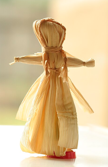 A handmade corn husk doll.